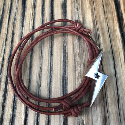 STRENGTH LIGHTNING BOLT BRACELET - BRONZE ON LEATHER CORD
